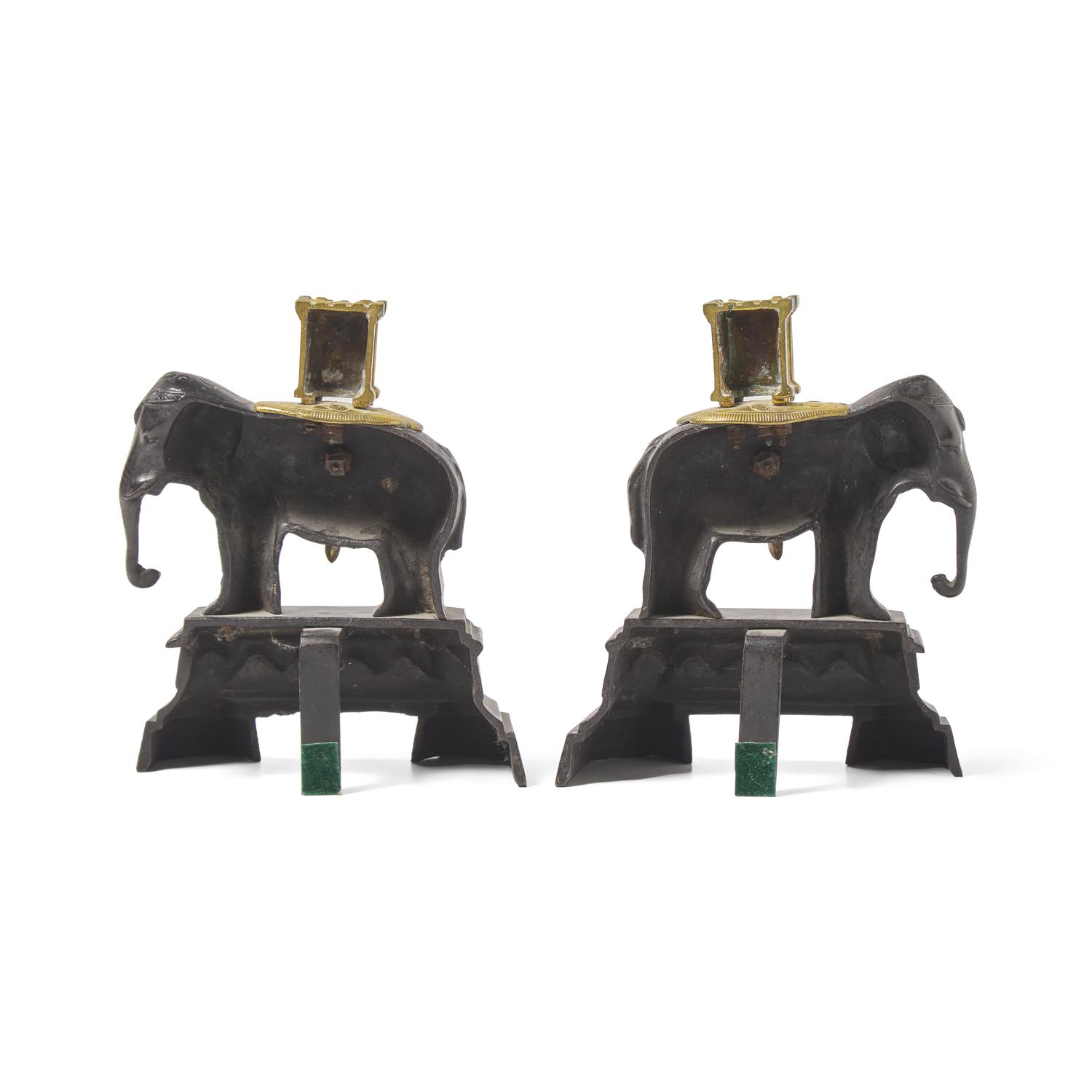 A Pair of French Patinated and Gilt Bronze Elephant-Form Chenets