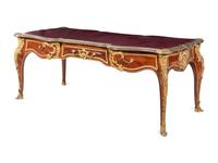 A Louis XV Style Gilt Bronze Mounted and Tooled Leather-Inset Tulipwood Bureau Plat