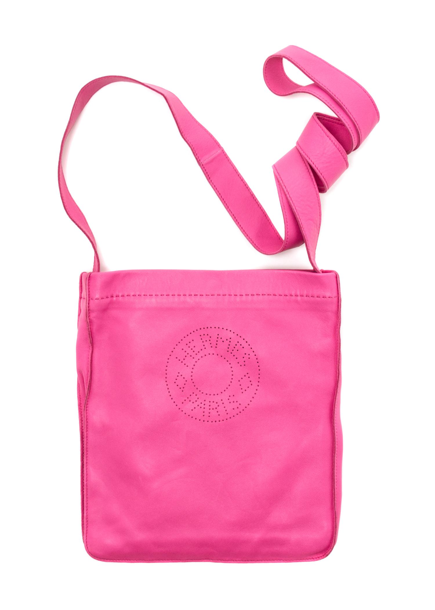 An Hermes Rose Tyrien Agneau Clou de Selle Pouch, 6" x 9" x 1".