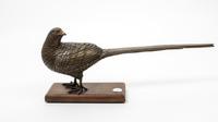 A Bronze Model of a Pheasant Width 19 1/2 inches. — 20TH CENTURY