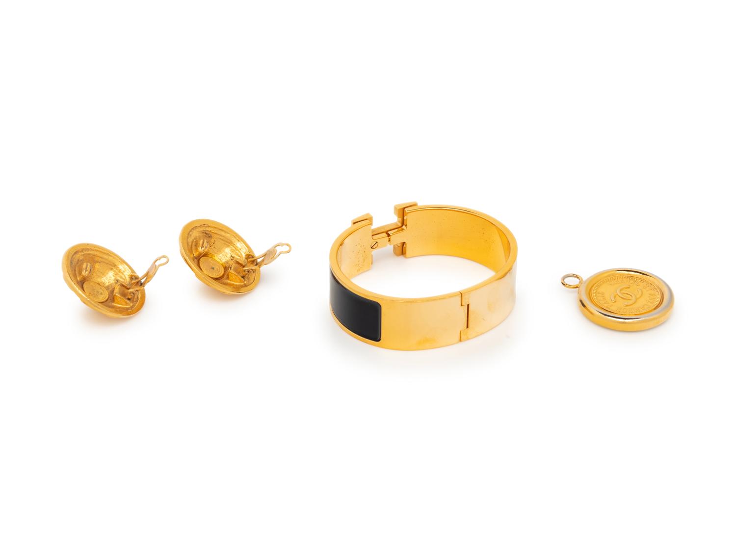 A Group of Three Costume Jewelry Pieces by Hermès and Chanel