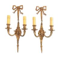 A Set of Four Louis XVI Style Gilt Metal Two-Light Sconces