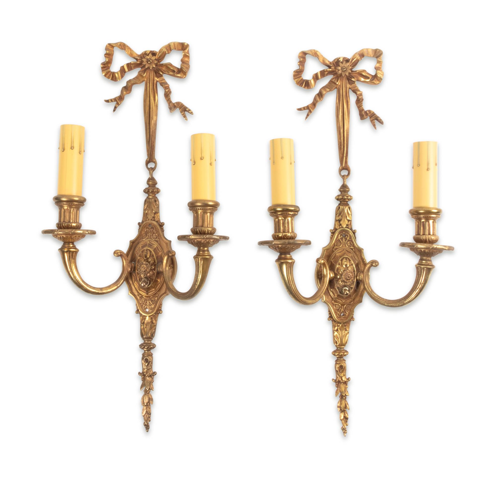 A Set of Four Louis XVI Style Gilt Metal Two-Light Sconces