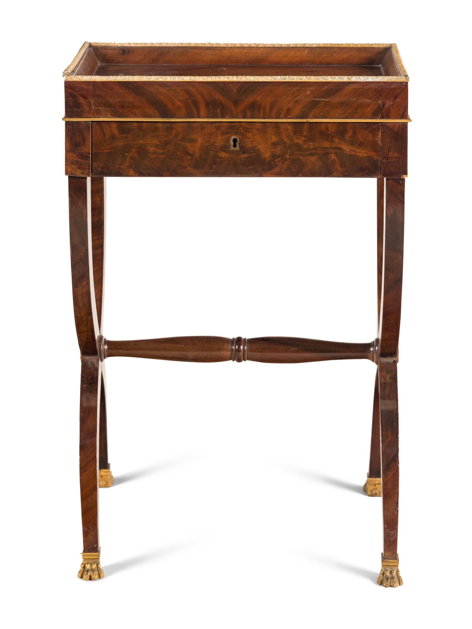 A Restauration Gilt Bronze Mounted Mahogany Writing Table