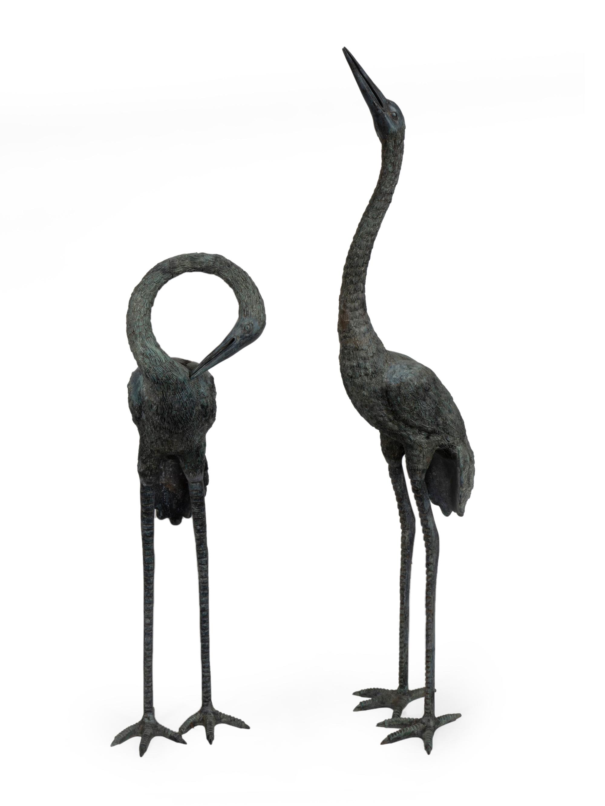 A Pair of Bronze Herons — 20TH CENTURY