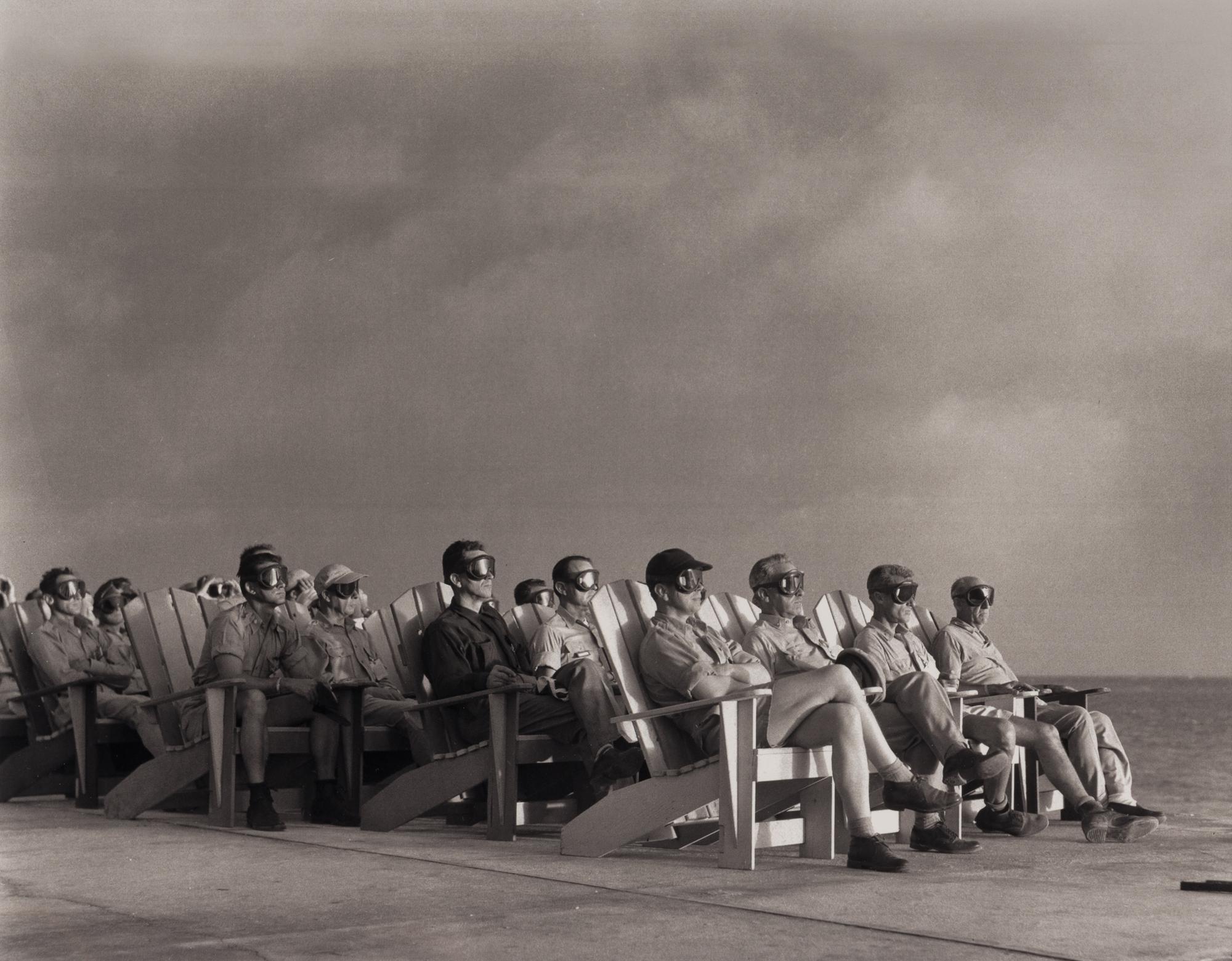 [OPERATION GREENHOUSE - DOG TEST]. Photograph of VIP observers lit up by the light of an atomic bomb on Enewetak Atoll 1951 (but printed 2009).