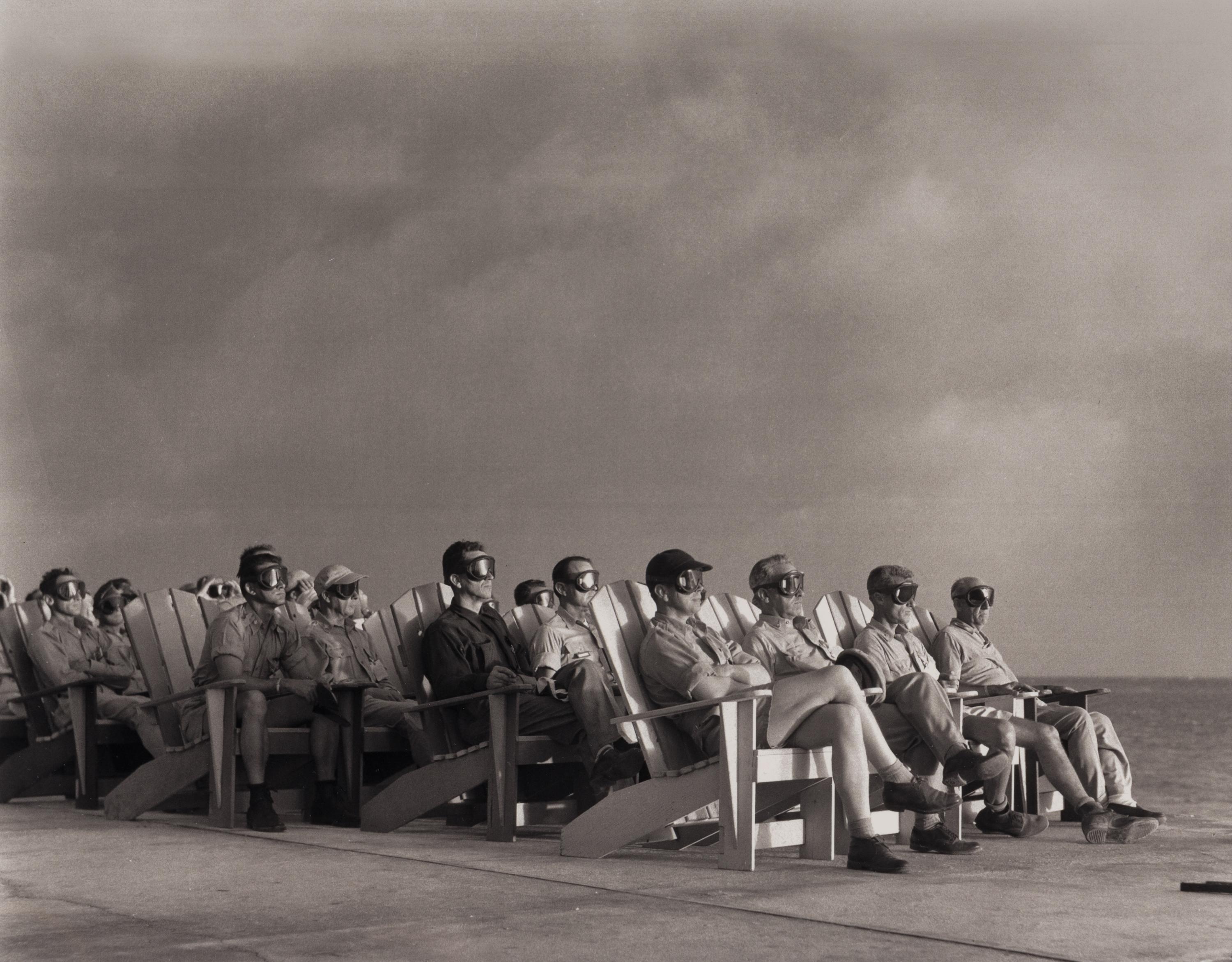 [OPERATION GREENHOUSE - DOG TEST]. Photograph of VIP observers lit up by the light of an atomic bomb on Enewetak Atoll 1951 (but printed 2009).