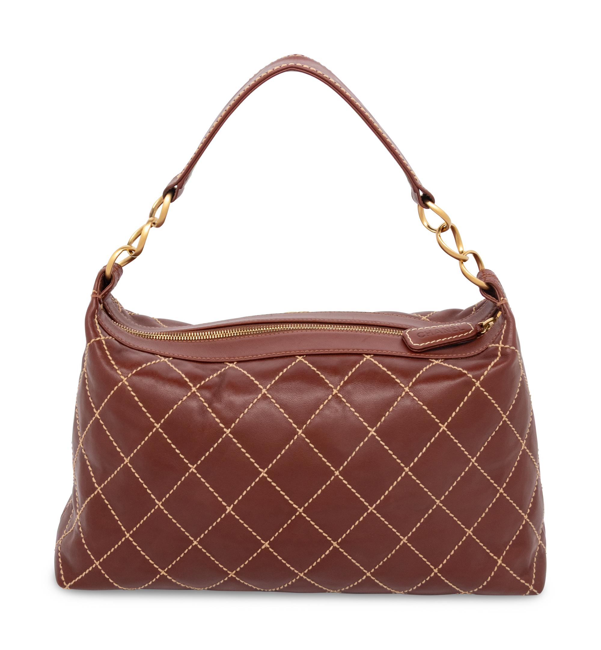 CHANEL, SURPIQUE LEATHER HOBO BAG