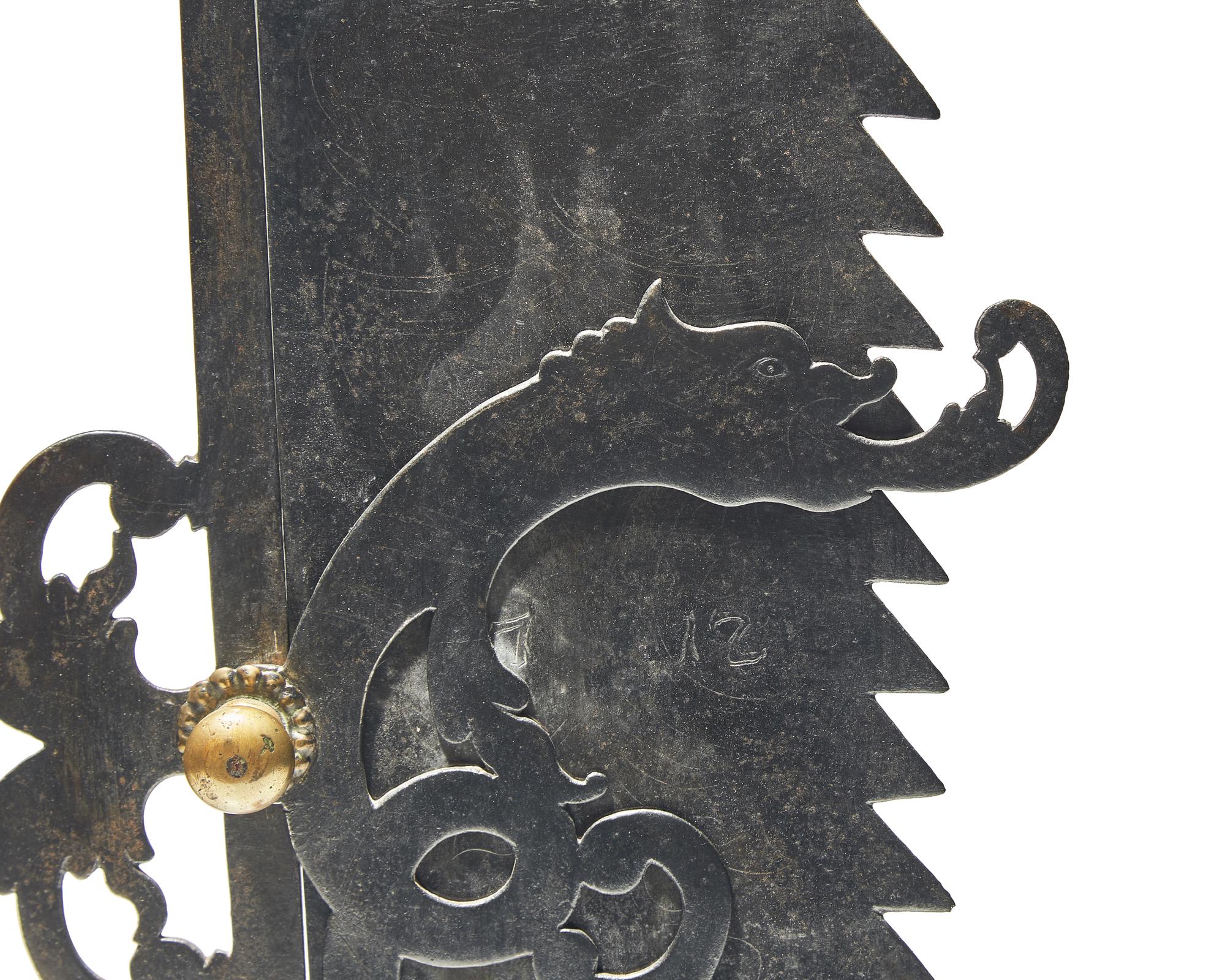 An Elaborate Wrought Iron and Brass Fireplace Trammel, Northern European, Dated "1712"