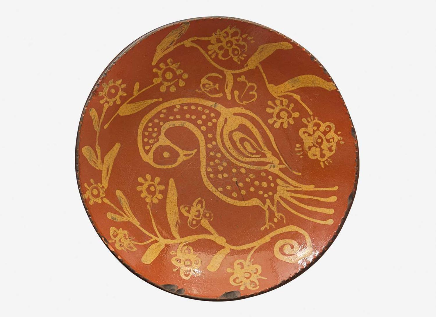 A glazed and slip-decorated redware plate, After Benjamin Bergey (1797-1854), Franconia Township, Montgomery County, PA, 20th century