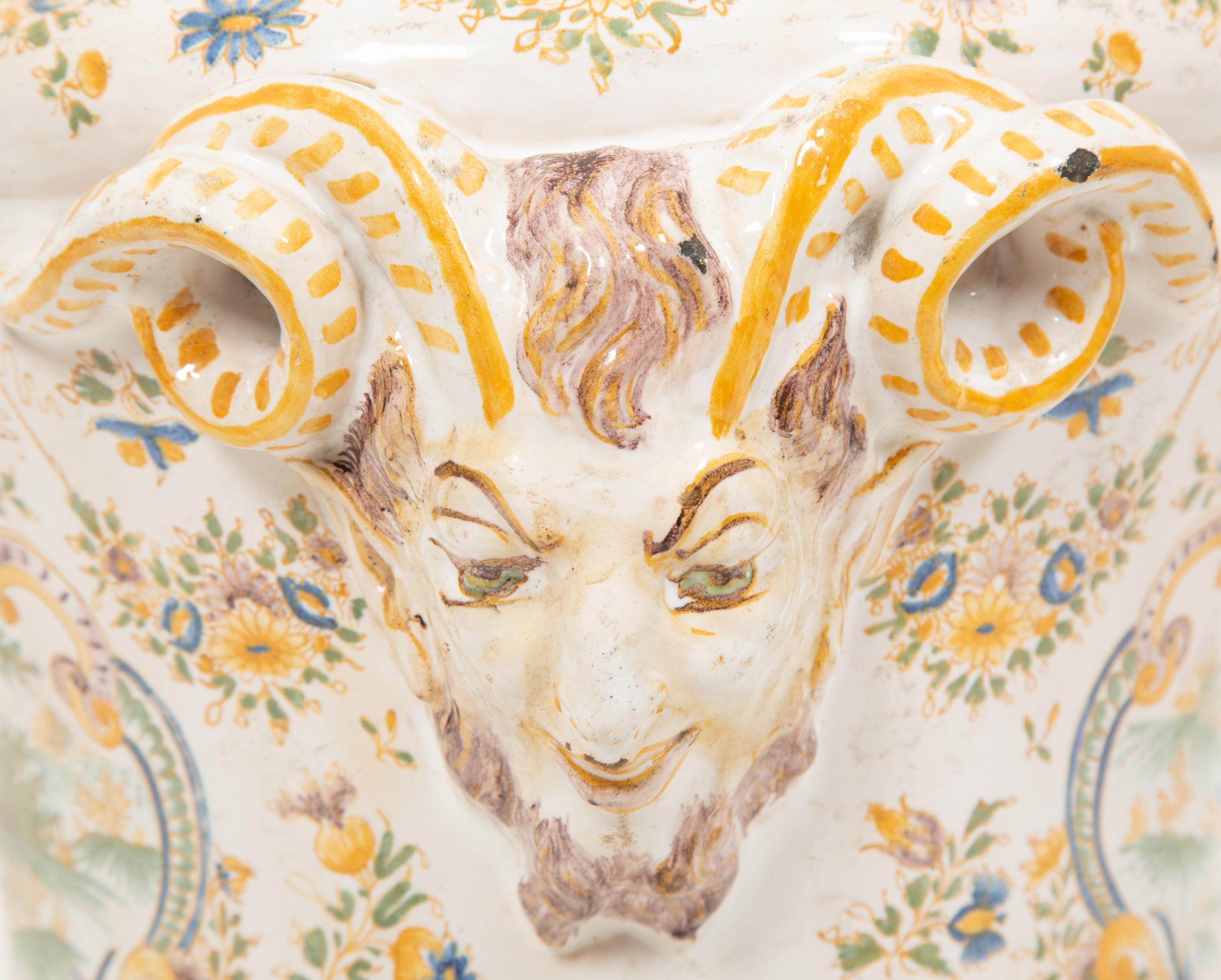 A Large Majolica Covered Urn with Horned Satyr Mask Handles