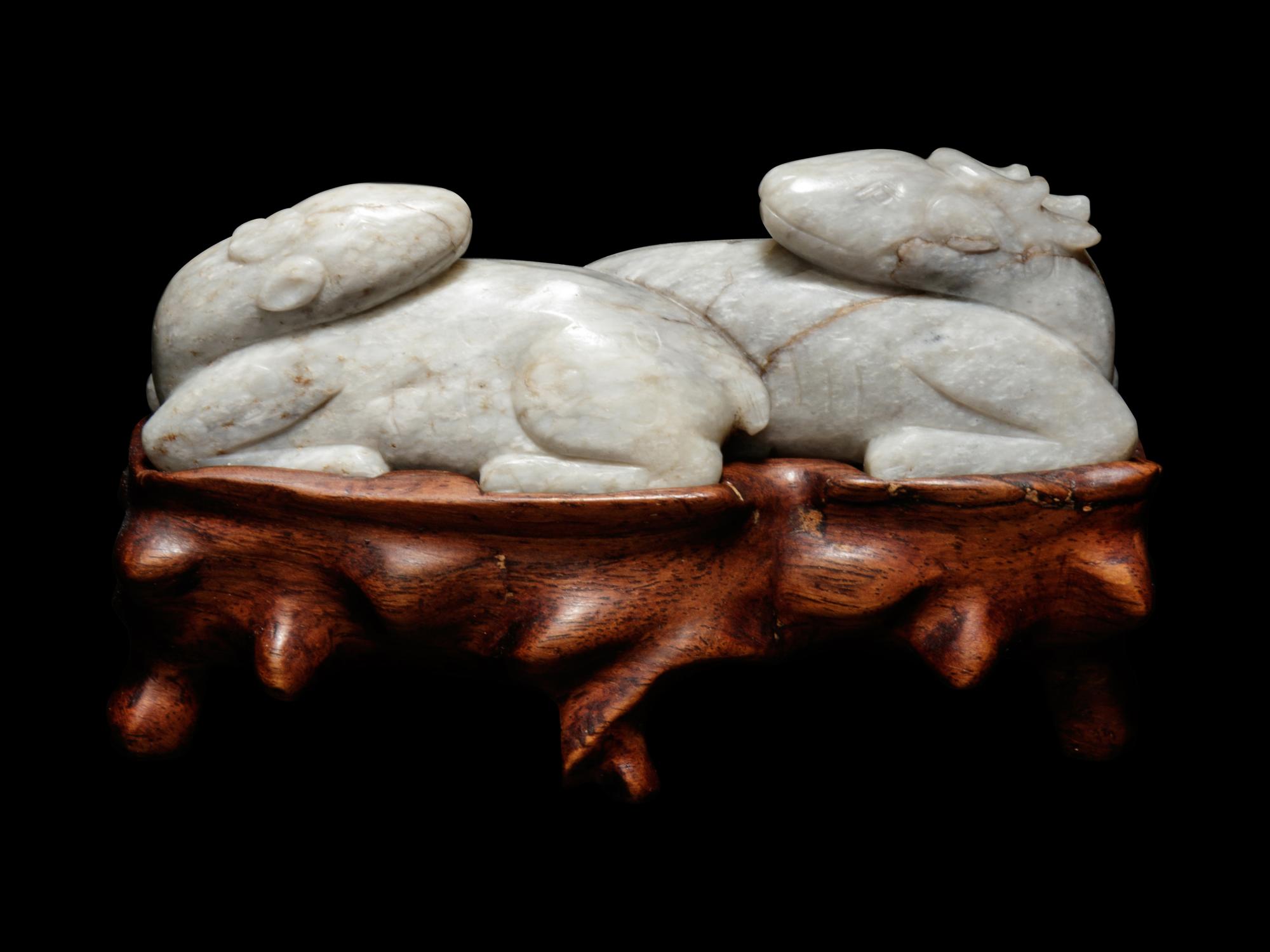 A Mottled Grey Jade Carving of Double Deers