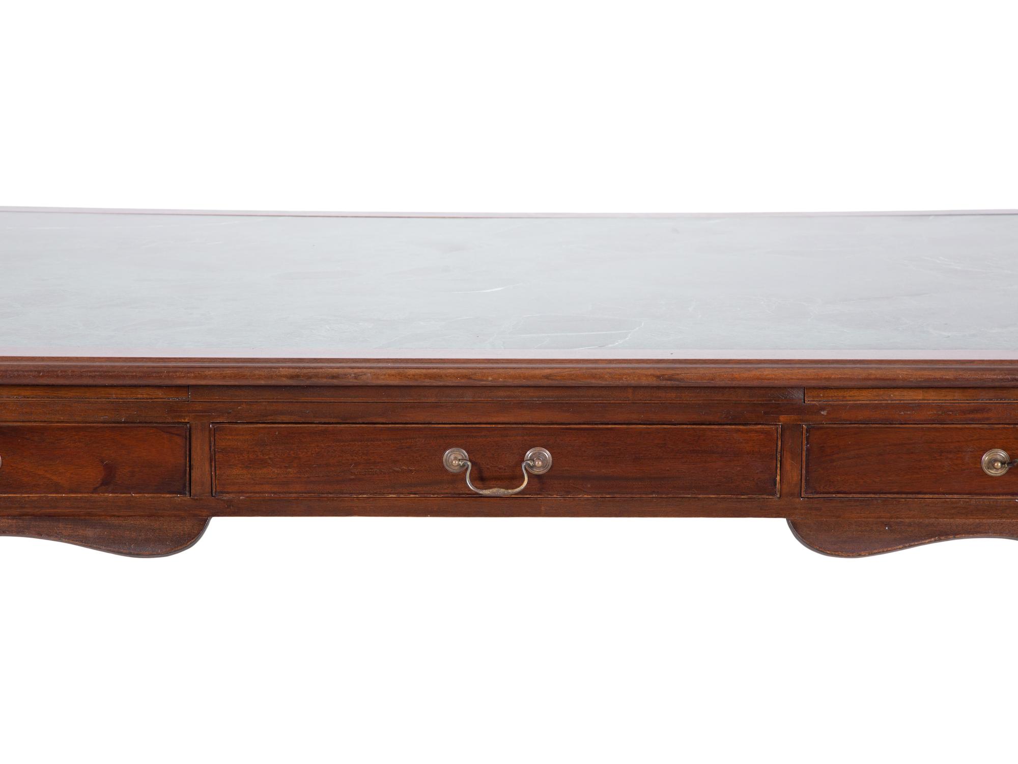 A Georgian Style Mahogany Partner's Desk with Inset Marble Top