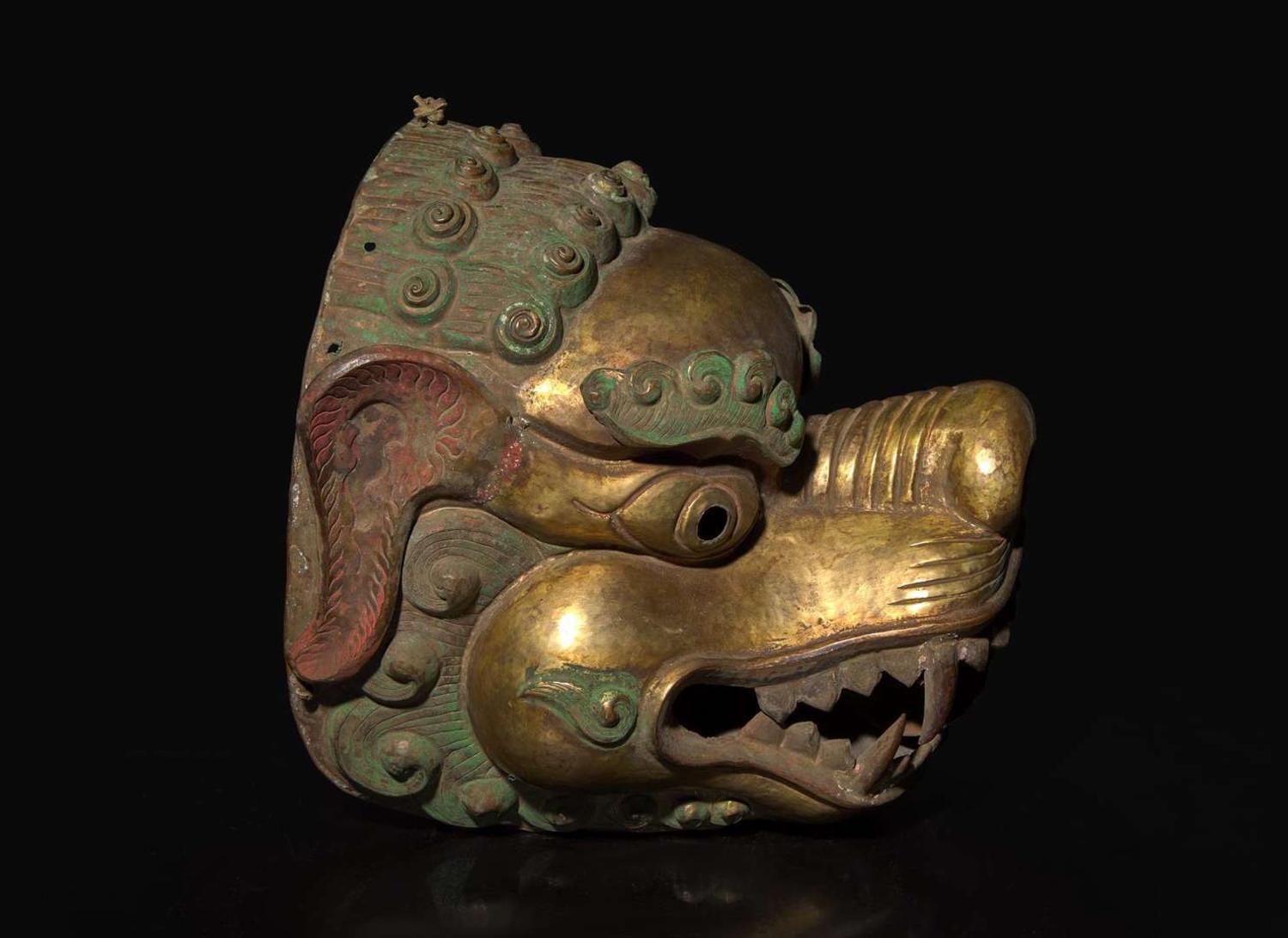 A Tibetan gilt and polychromed repousse copper snow lion mask, 18th/19th century 藏傳銅獅面具