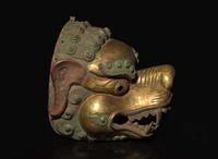 A Tibetan gilt and polychromed repousse copper snow lion mask, 18th/19th century 藏傳銅獅面具