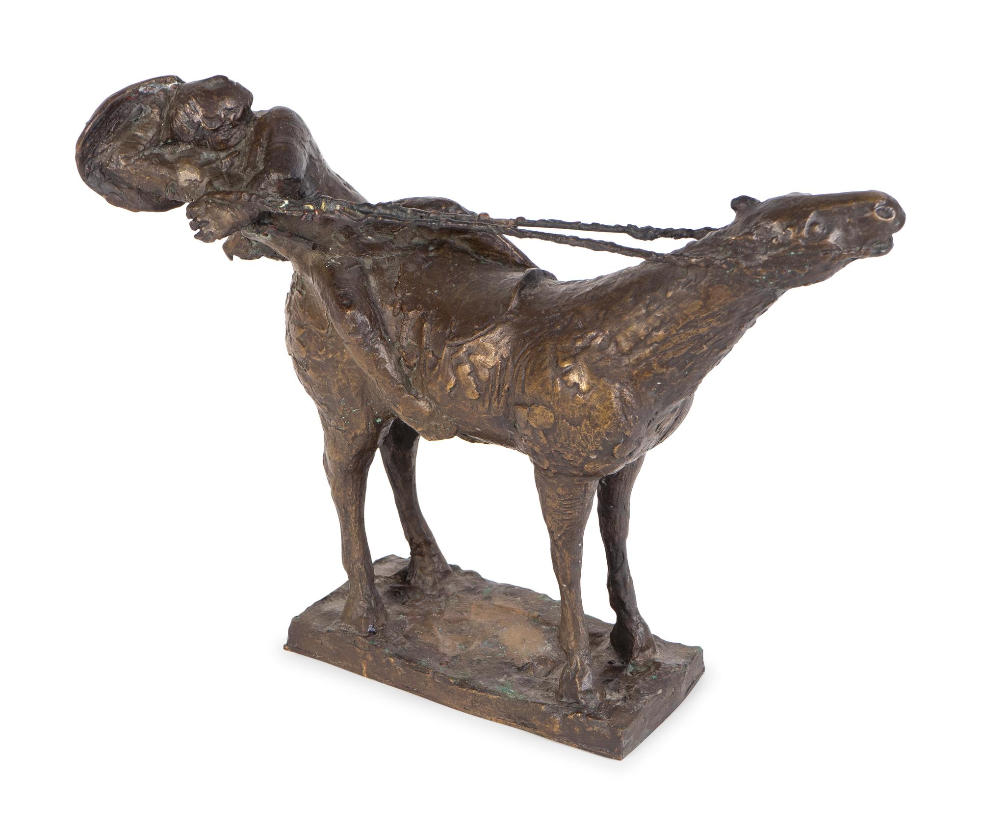 A Patinated Bronze Figure of a Horse and Rider