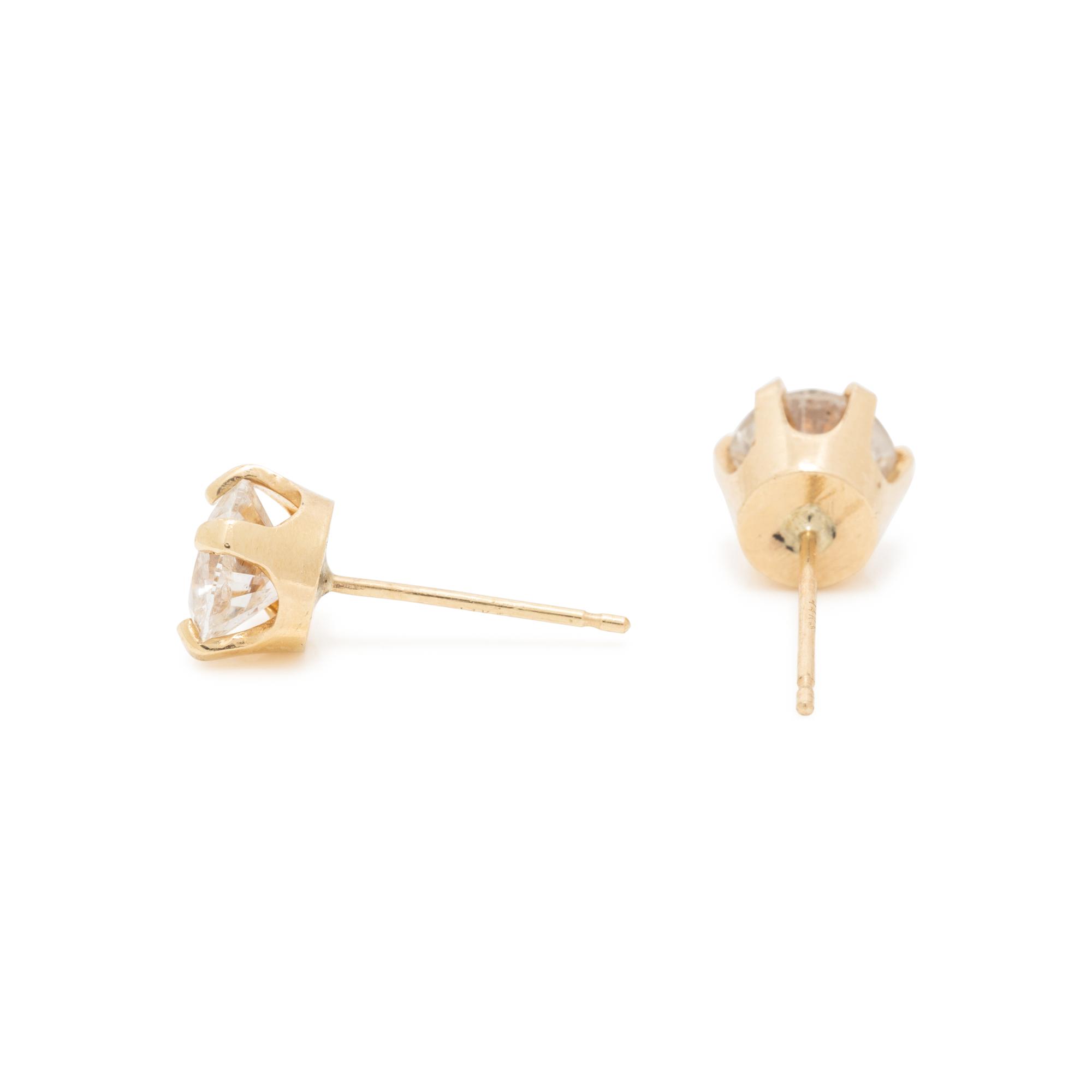 COLLECTION OF YELLOW GOLD AND DIAMOND STUD EARRINGS