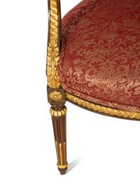 A Louis XVI Style Stained and Gilt Mahogany Fauteuil
