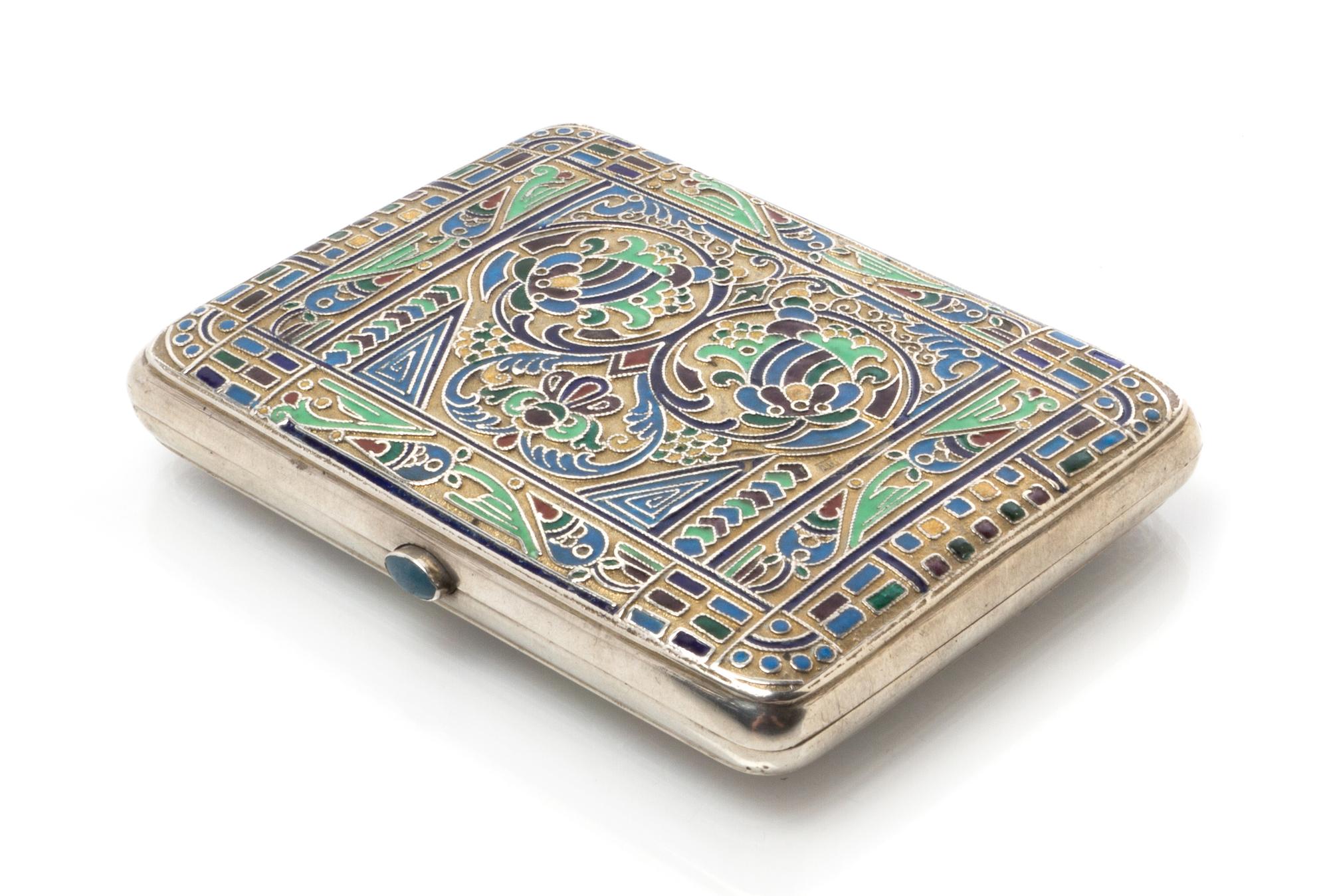 A Russian Silver and Enamel Cigarette Case, Mark of D. Nikolayev, Moscow, the case having a gilt wash ground with foliate and geometric