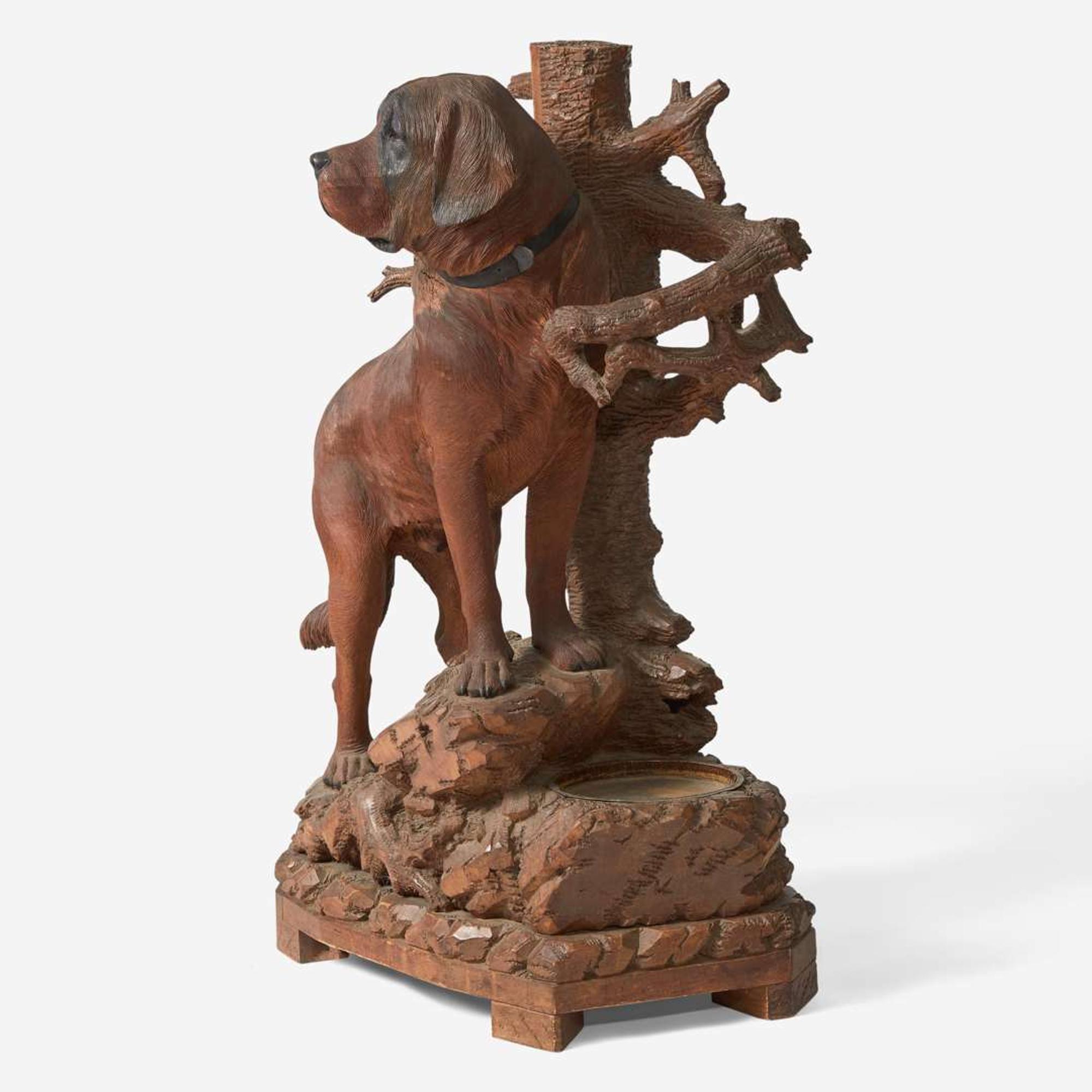 A Black Forest carved walnut hall stand with faux bois stump and English Labrador Swiss or German, late 19th / early 20th century