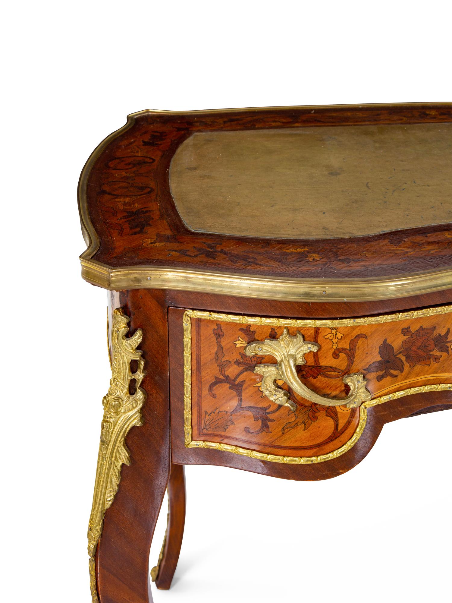 A Louis XV Style Gilt Bronze Mounted Marquetry Bureau Plat