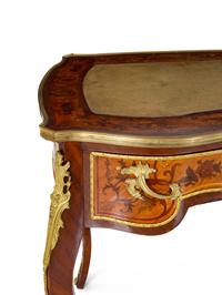 A Louis XV Style Gilt Bronze Mounted Marquetry Bureau Plat