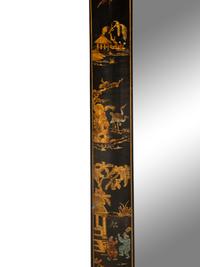 A Black Japanned Cushion Mirror
