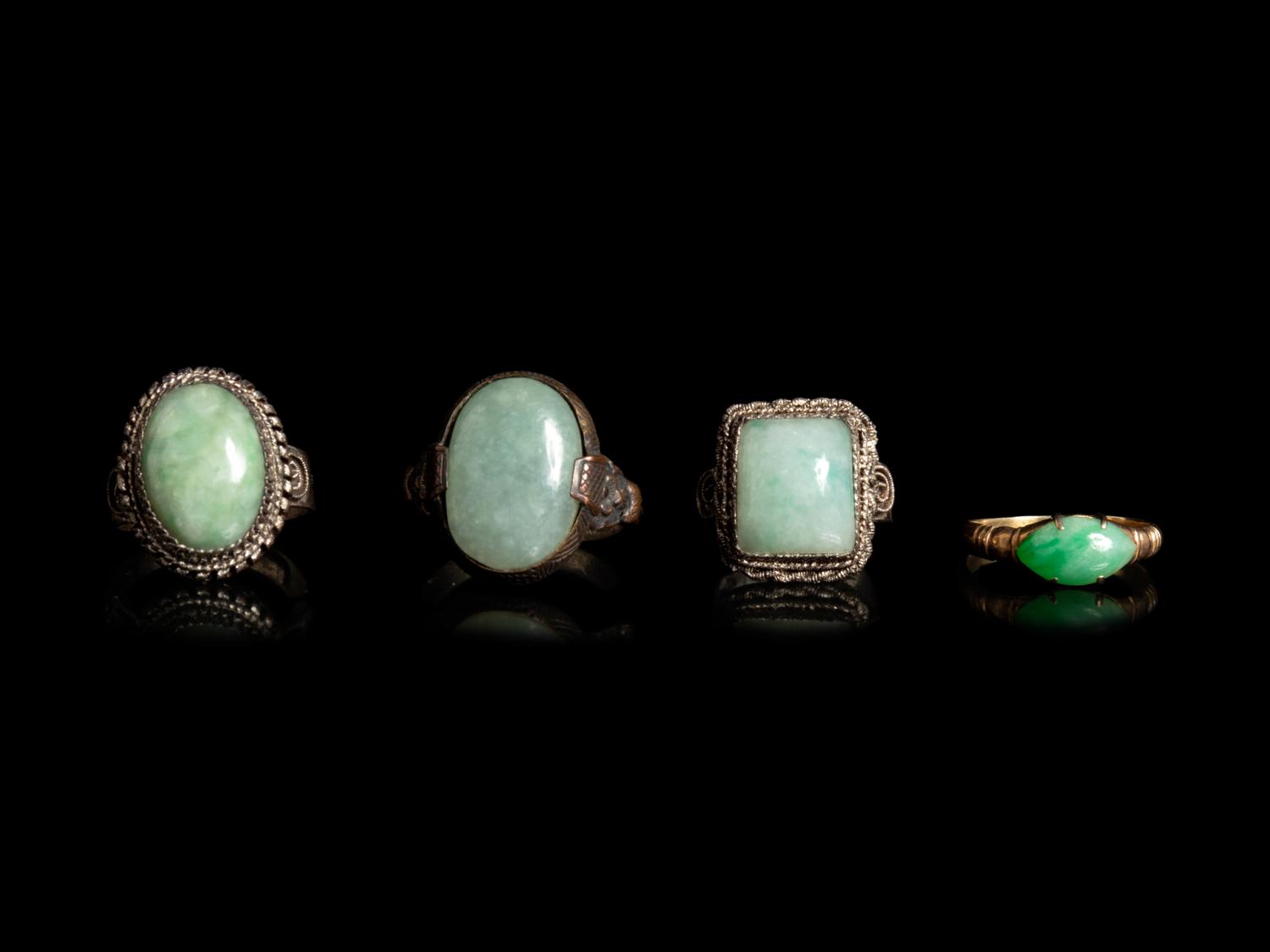 Four Chinese Jadeite Inset Metal Rings