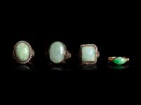 Four Chinese Jadeite Inset Metal Rings