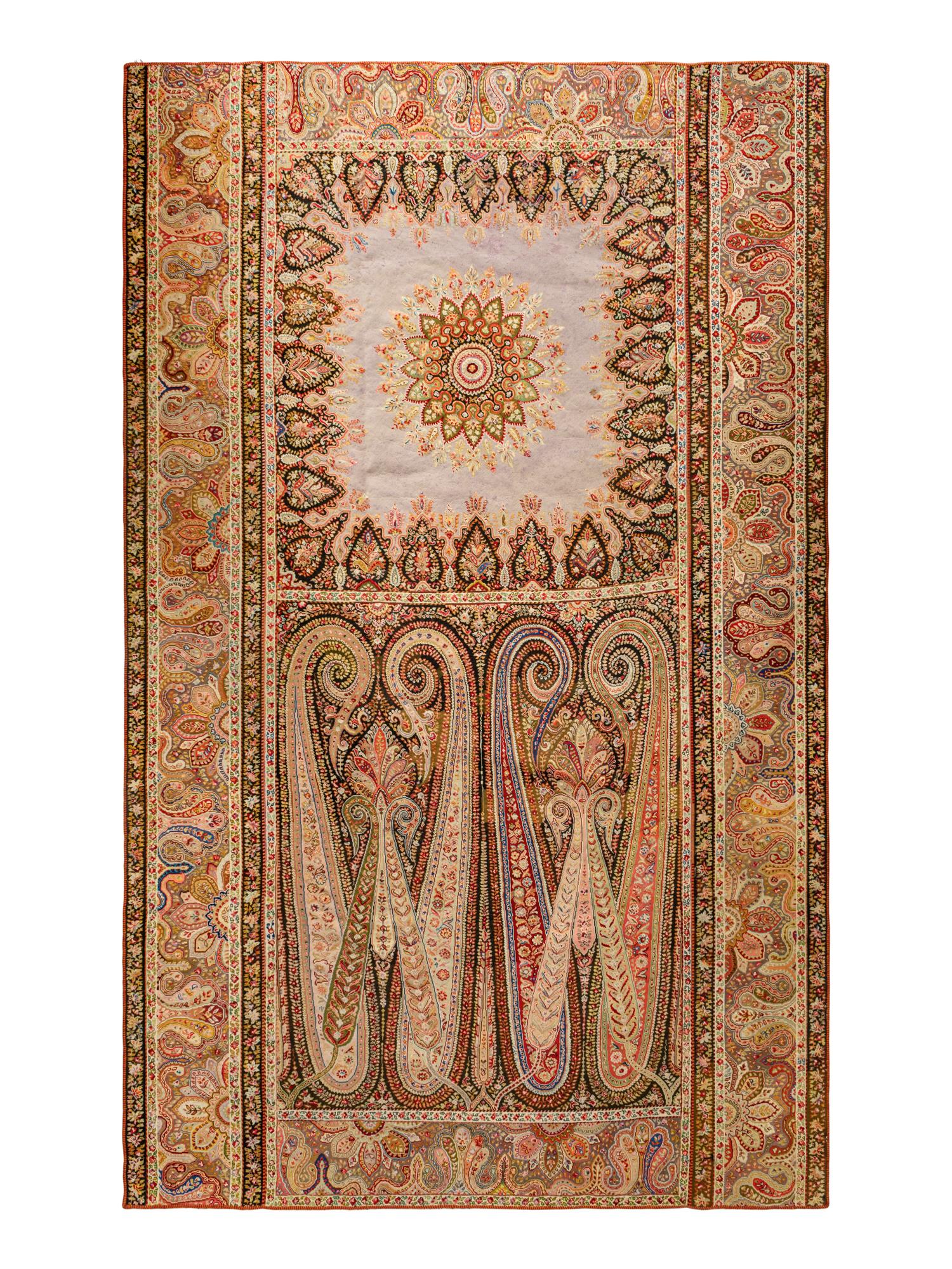 A Persian Paisley Needlework Rug