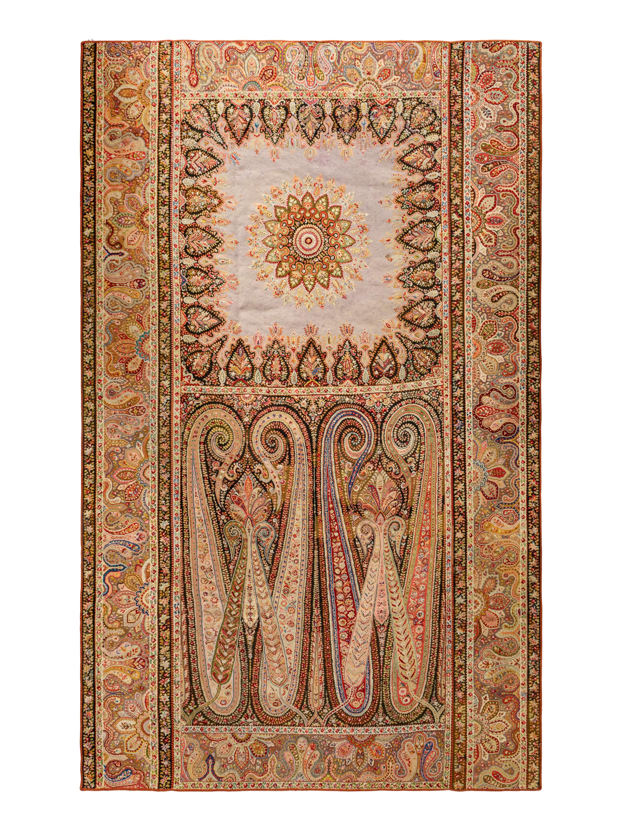 A Persian Paisley Needlework Rug