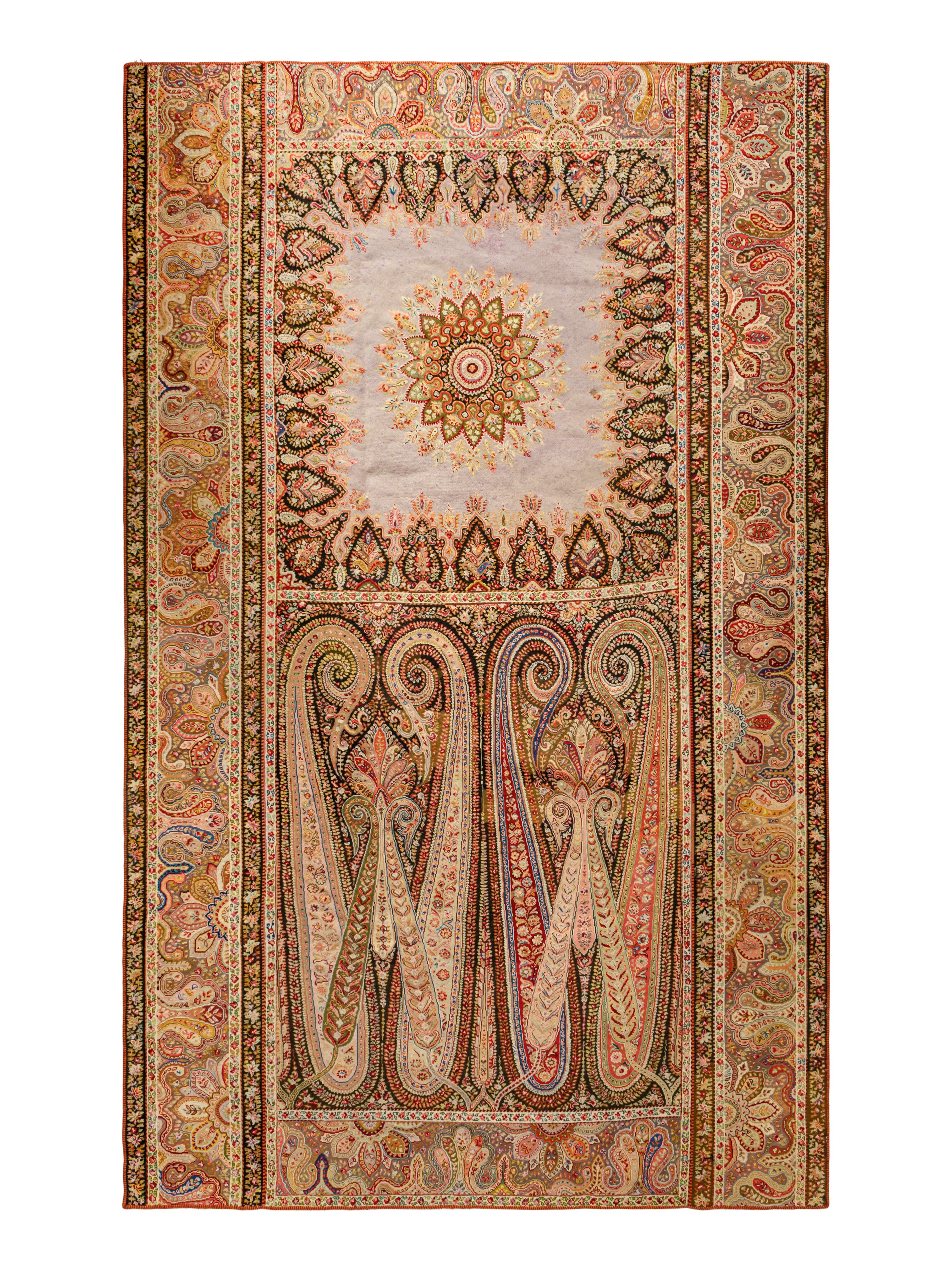 A Persian Paisley Needlework Rug