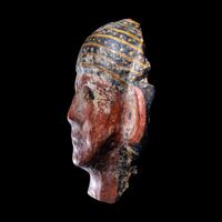 An Egyptian Cartonnage Mummy Mask