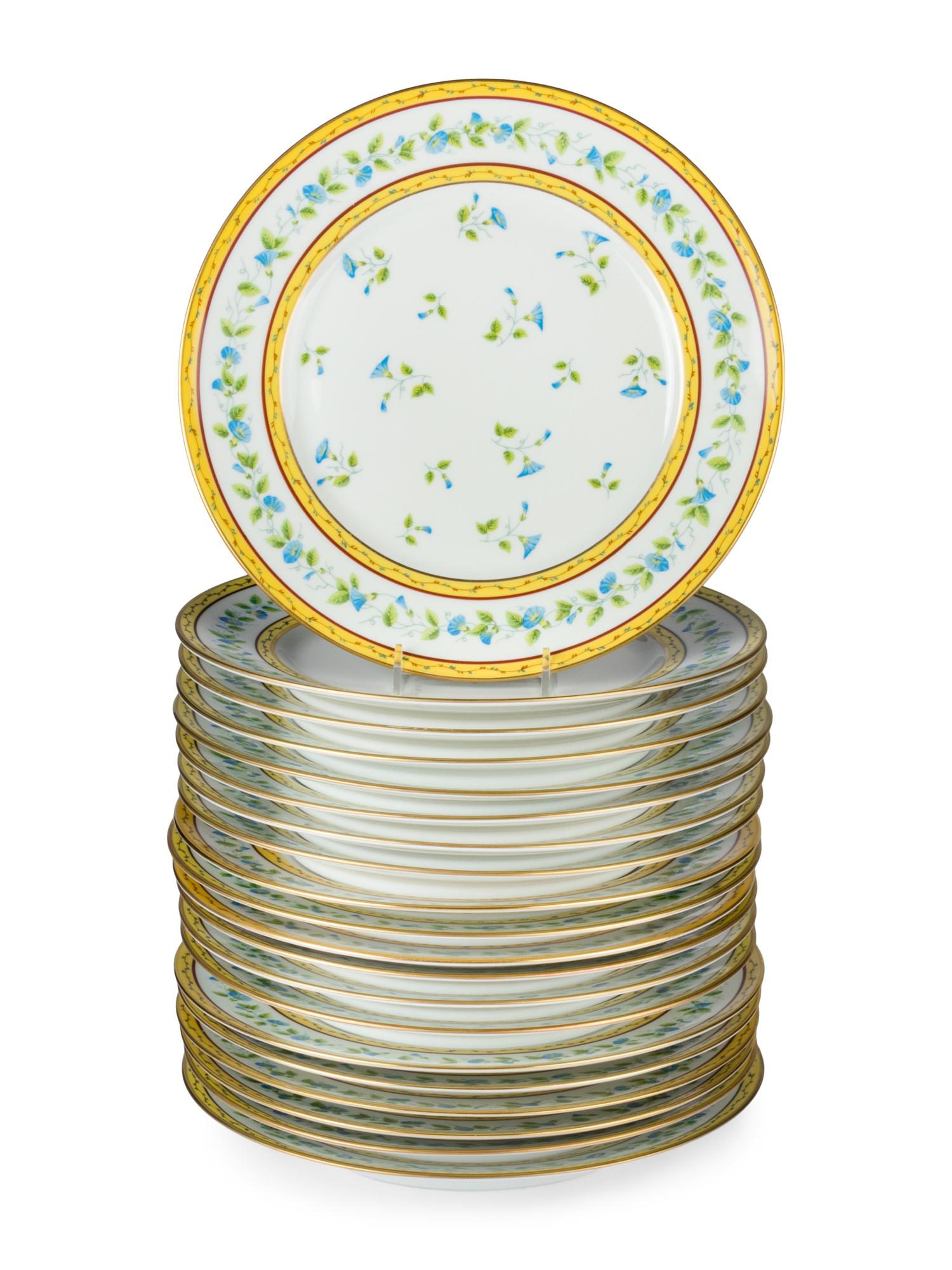 A Raynaud Limoges Porcelain Dinner Service