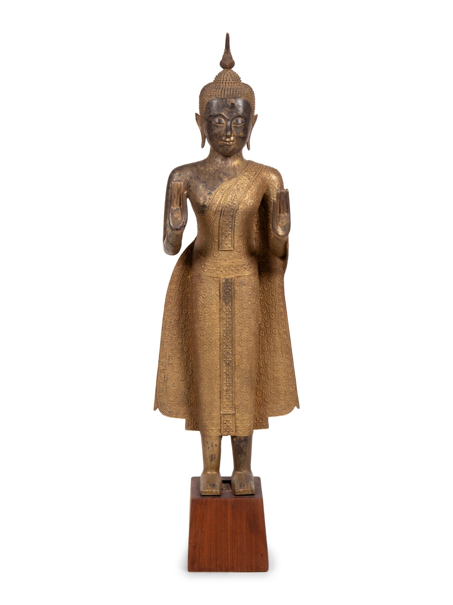 A Large Thai Gilt Decorated Bronze Figure of Standing Buddha