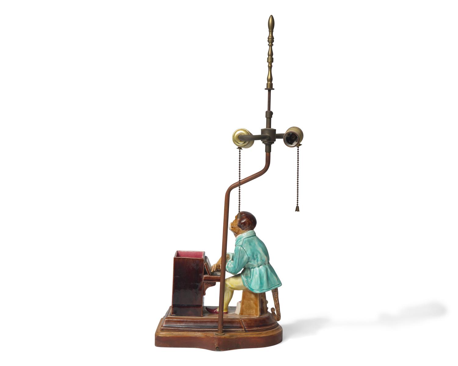 A French Majolica Humidor in the Form of Monkey Playing the Piano, Mounted as a Lamp