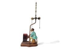 A French Majolica Humidor in the Form of Monkey Playing the Piano, Mounted as a Lamp