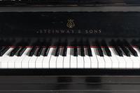 A Steinway and Sons Ebonized Grand Piano