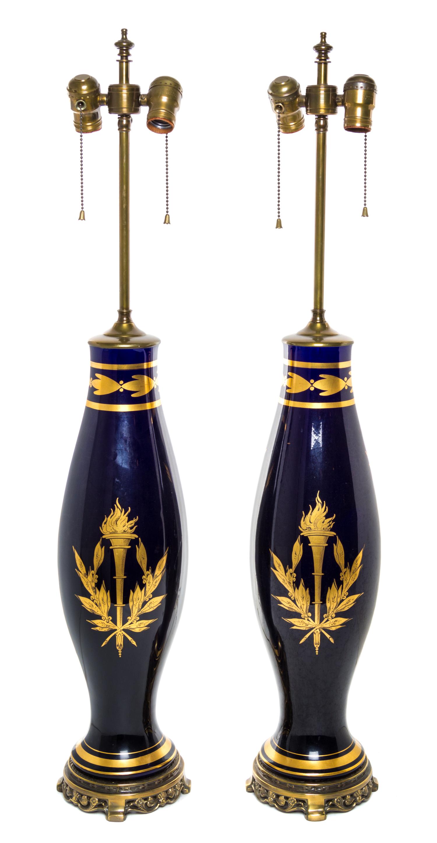 A Pair of French Gilt Metal Mounted Porcelain Lamps Height overall 35 inches.