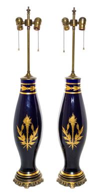 A Pair of French Gilt Metal Mounted Porcelain Lamps Height overall 35 inches.