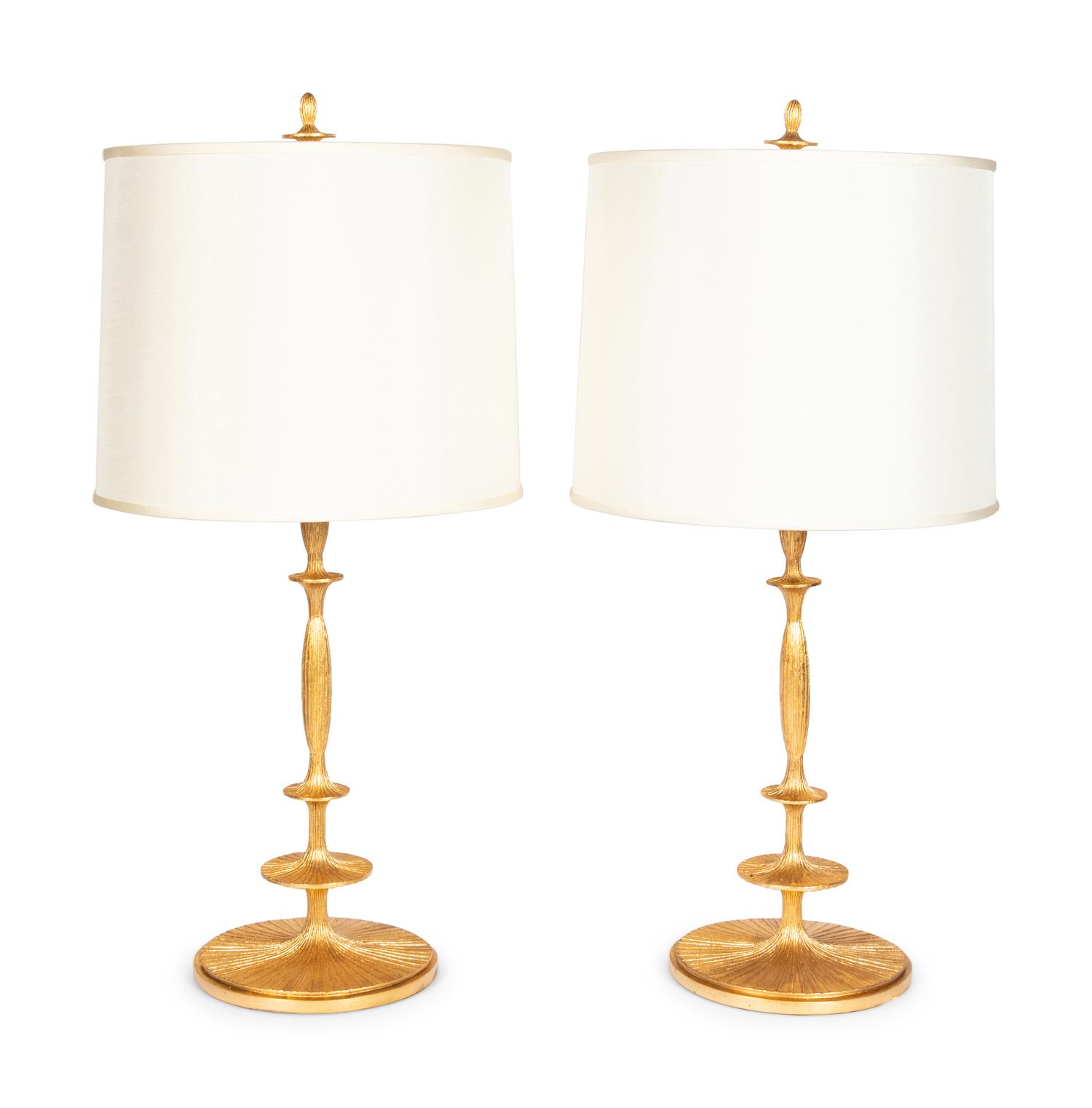 A Pair of Gilt Resin Table Lamps with Shades