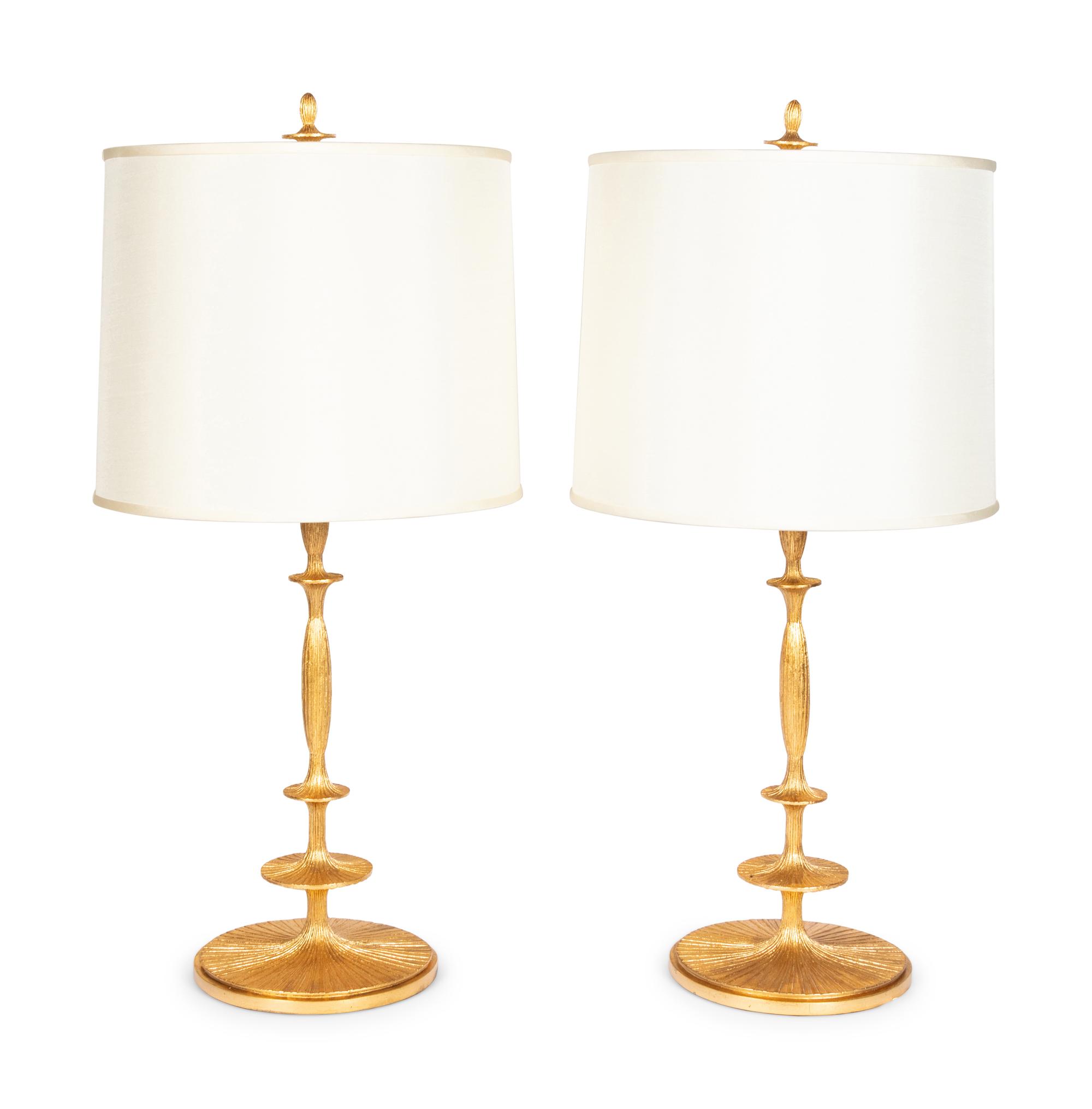 A Pair of Gilt Resin Table Lamps with Shades