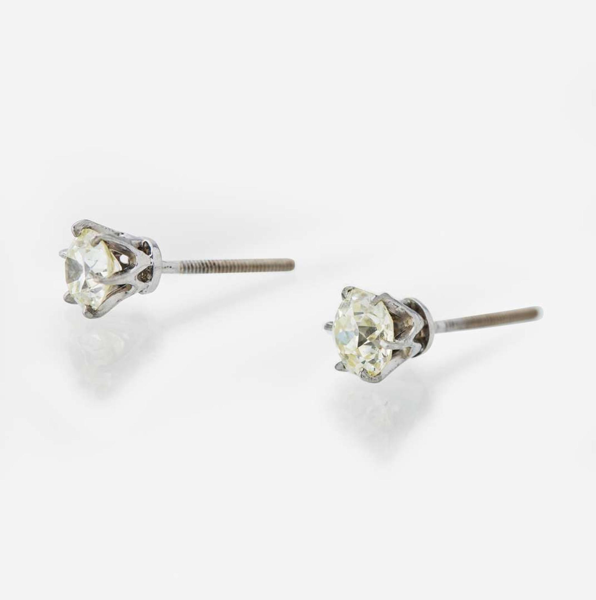A Pair of Diamond Stud Earrings