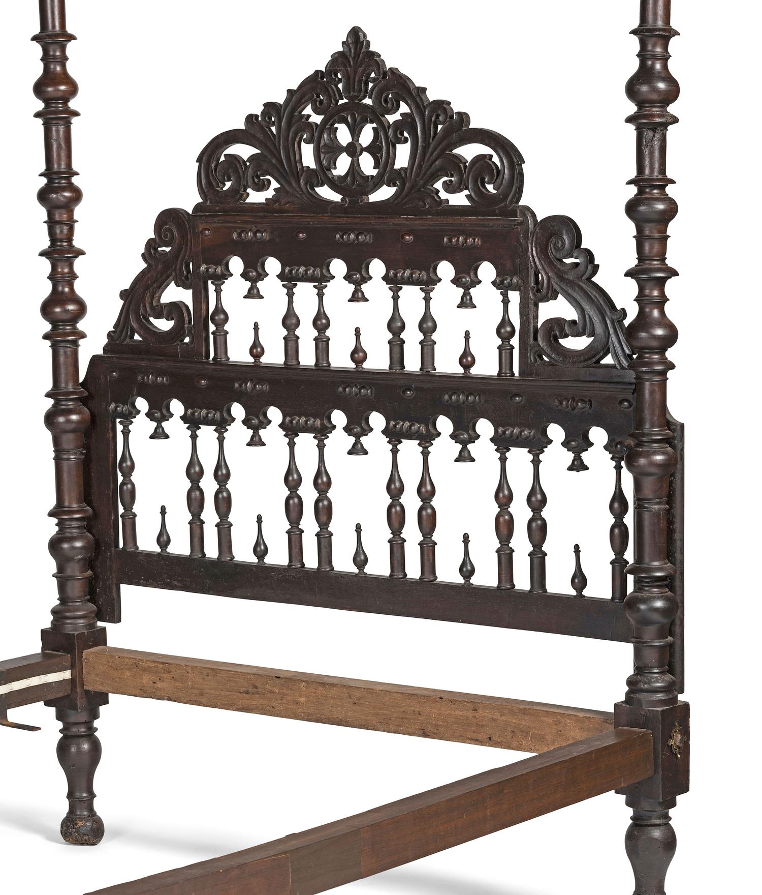 A Gothic Revival Walnut Four Poster Bed