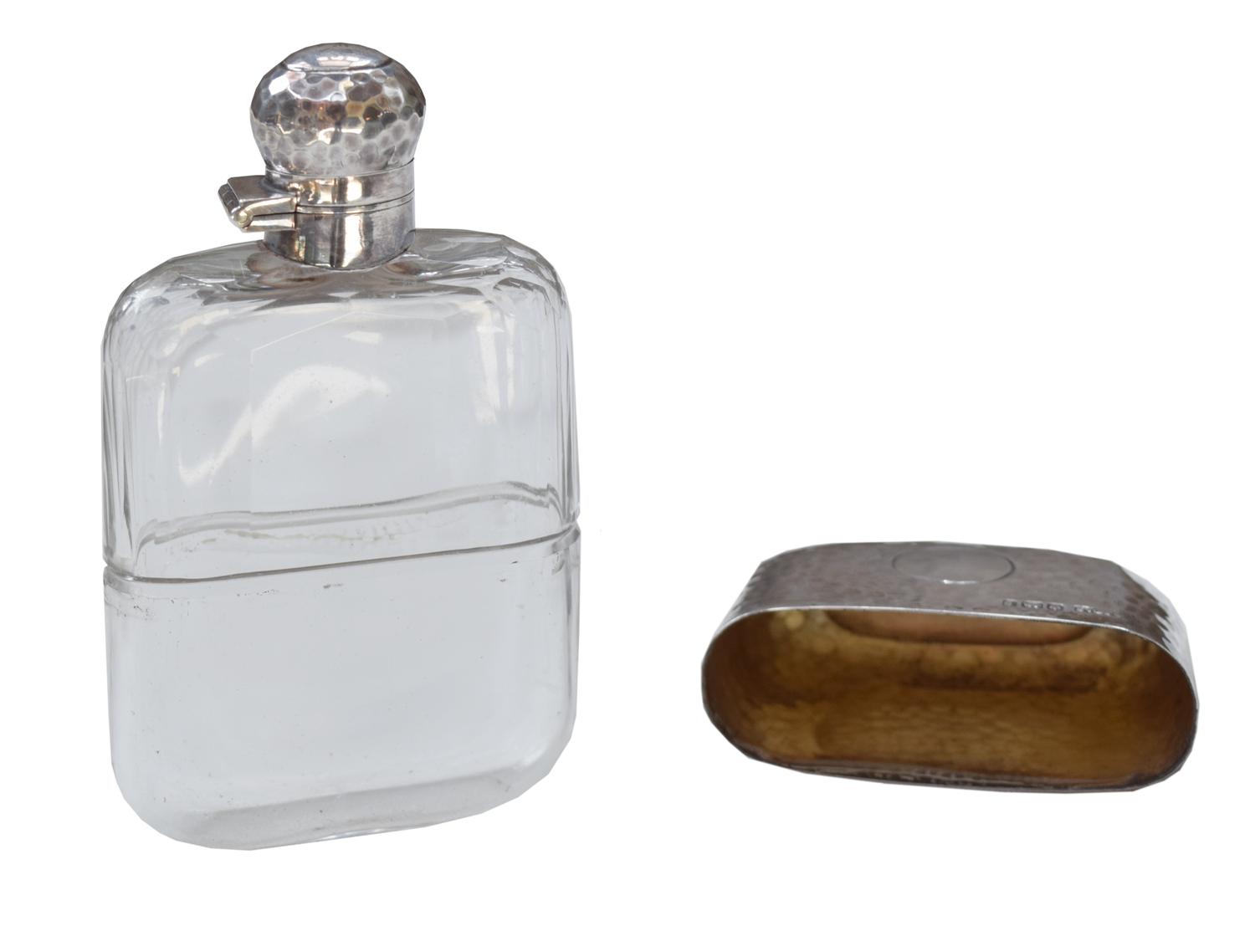 A James Dixon & Sons Hammered Silver and Glass Flask 2.5" W x 1" D x 4.5" H — England, Circa 1911