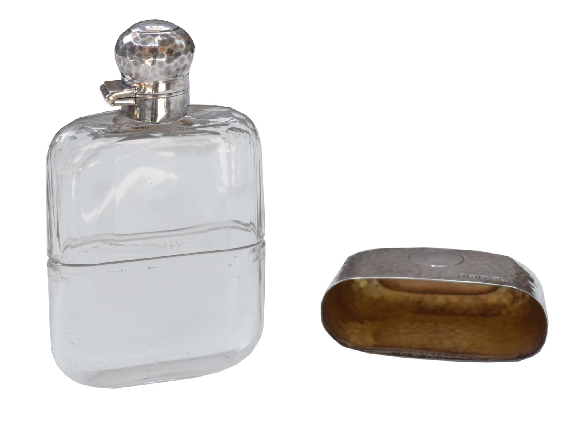 A James Dixon & Sons Hammered Silver and Glass Flask 2.5" W x 1" D x 4.5" H — England, Circa 1911