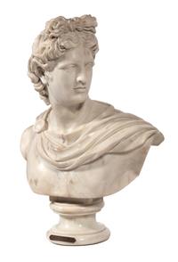 An Italian White Marble Bust of Apollo Height 32 x width 24 inches. — AFTER THE ANTIQUE/19TH CENTURY