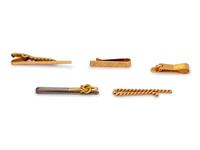 A Collection Yellow Gold and Titanium Tie Bars,