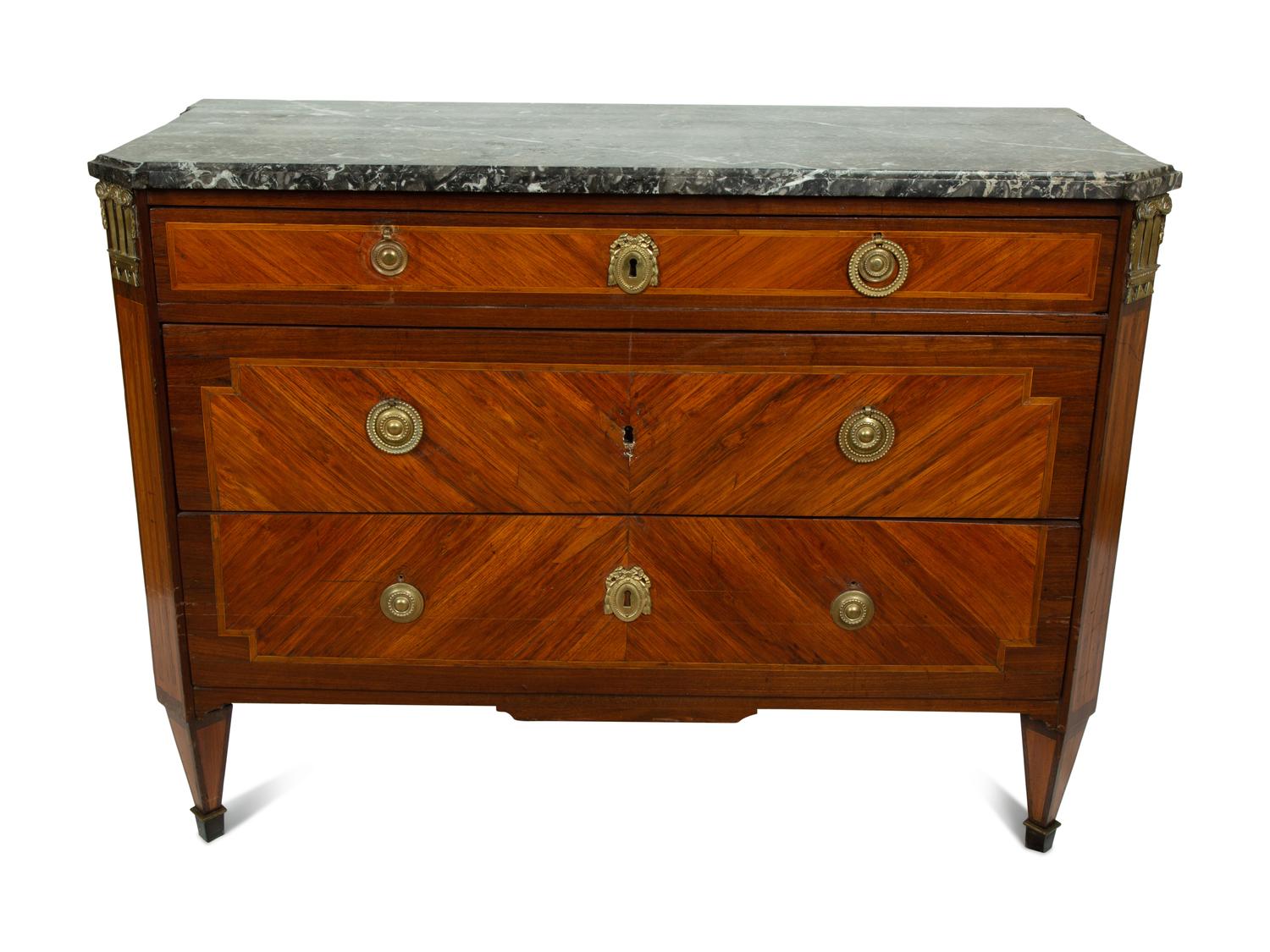 A Louis XVI Style Gilt Bronze Mounted Commode — LATE 18TH CENTURY