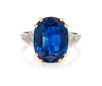 A Platinum, Yellow Gold, Sapphire and Diamond Ring, 4.10 dwts.